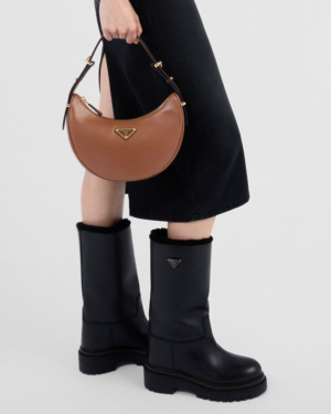 [프라다] 가죽과 시어링 부츠 1U635N_3LPN