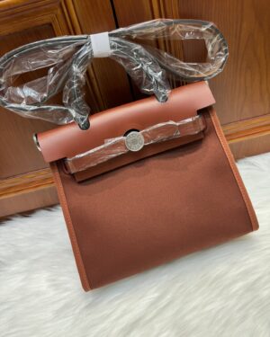 [에르메스] 에르백 zip mini 21Cm  Vache Hunter & Toile/ Cuivre Orange & Mecano Fauve - Silver