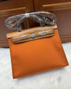 [에르메스] 에르백 Zip 31cm Vache Hunter & Toile/ Orange / Gold - Silver